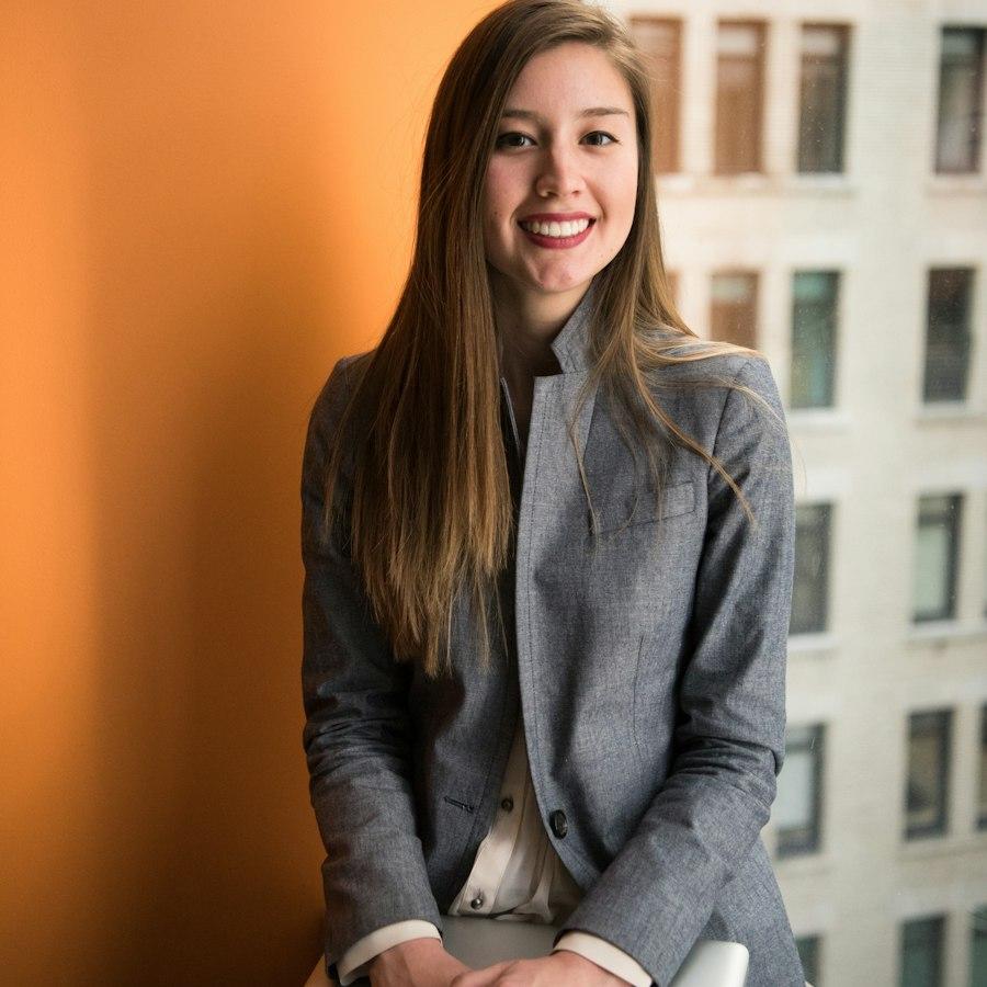 A smiling professional in a modern office