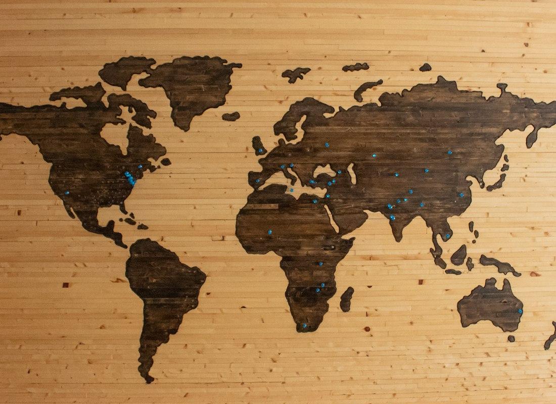 A world map carved in wood